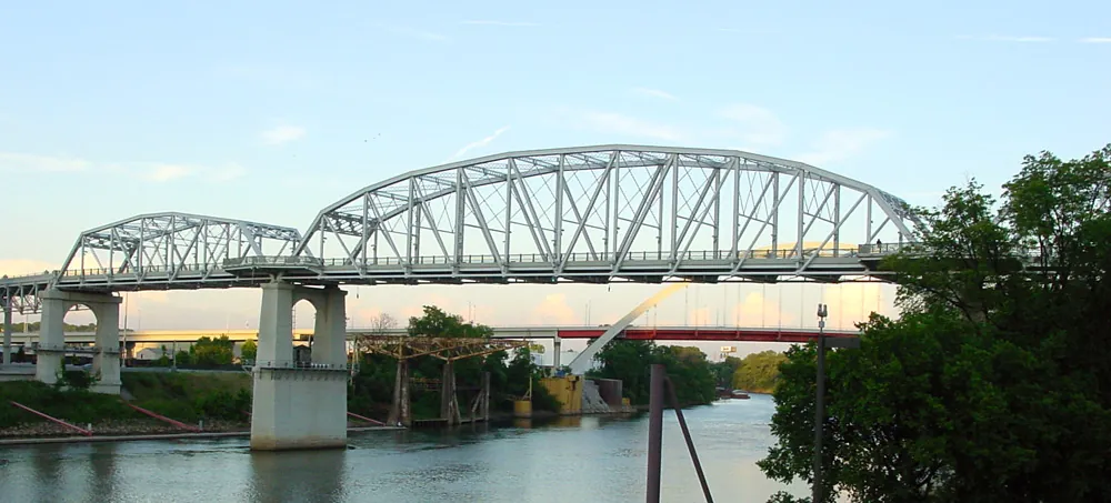 Steel trusses of the John Seigenthaler Pedestrian Bridge by day
